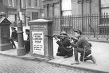 thumbnail: Free State soldiers fighting against Republican forces at O’Connell Bridge in Dublin during the Irish Civil War.  (Photo by Brooke/Topical Press Agency/Getty Images)