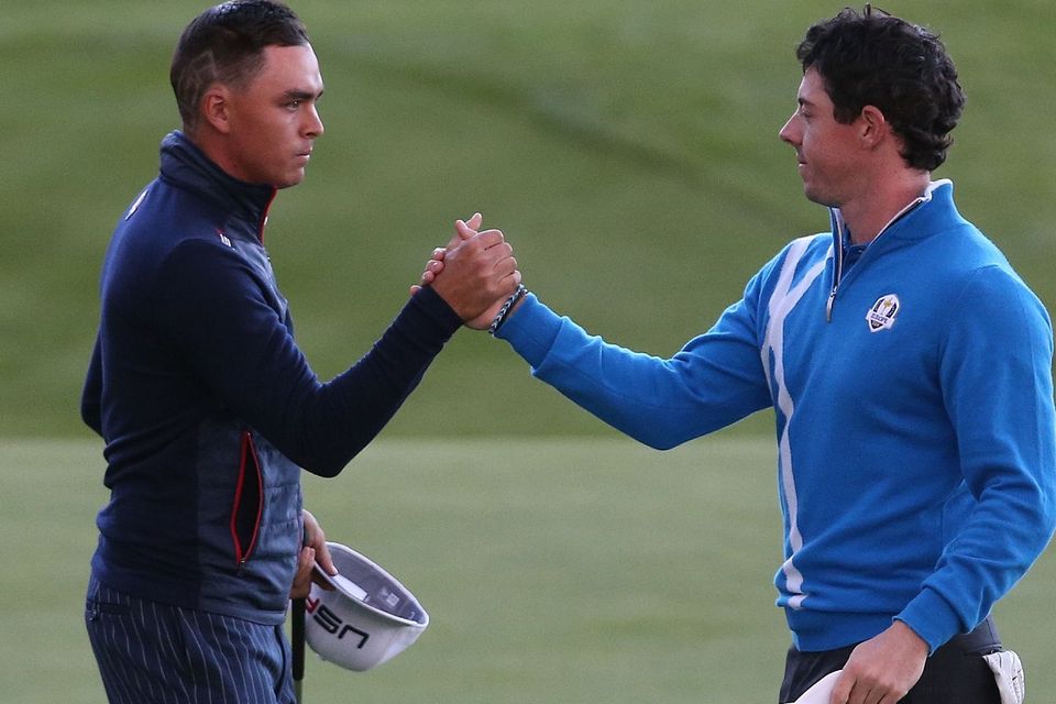 Rickie Fowler, left, and Rory McIlroy, right, will renew their on-course rivalry in Abu Dhabi