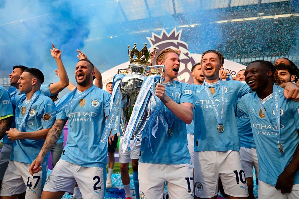 Man City's Kevin De Bruyne with the Premier League trophy. Photo: Getty Images