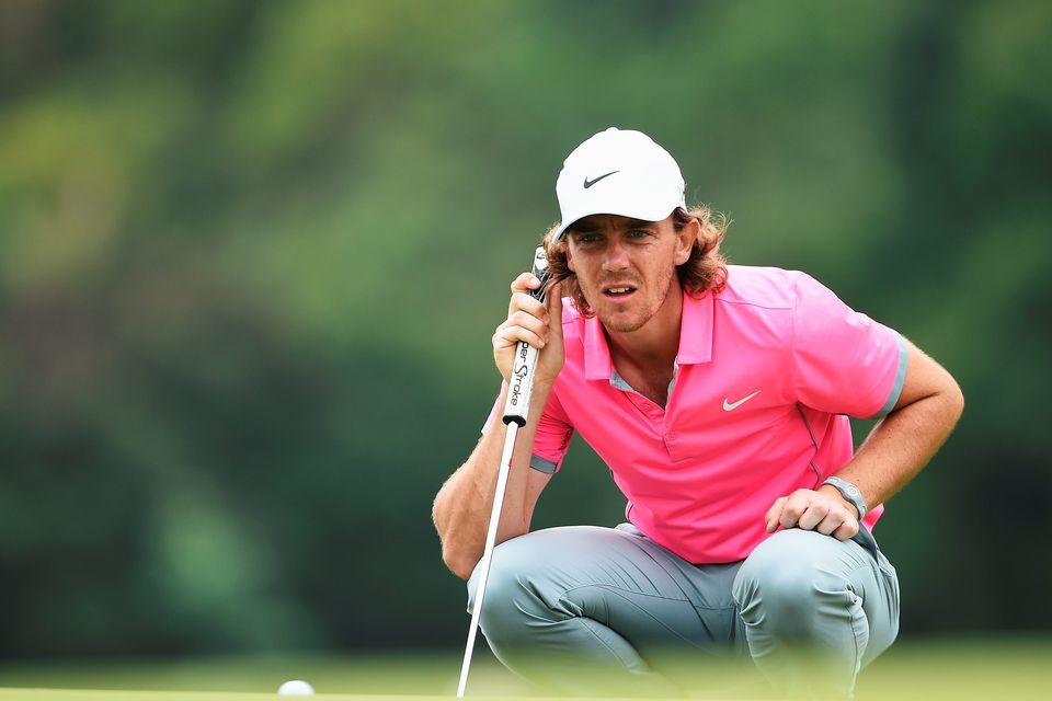 Tommy Fleetwood of England lines up a putt during the final round of the Shenzhen International