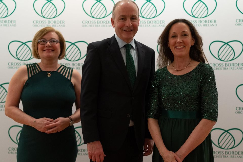 Consol General of Ireland Helen Nolan, Tainiste Michael Martin and Sharon Tracey-Dunne, director of the Cross Border Orchesta of Ireland