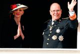 thumbnail: Prince Albert II of Monaco (R) and Princess Charlene of Monaco (L) appear on the balcony of the Monaco Palace during the celebrations marking Monaco's National Day