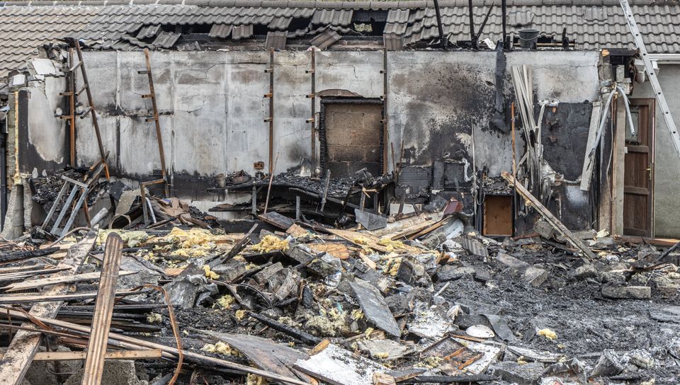 The Bot family home burnt to the ground on Good Friday. All that remains is ashes and debris and partial walls of a workshop. Photo by Michael Donnelly. 