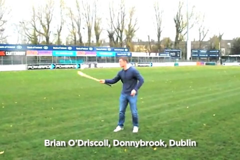Brian O'Driscoll displays his hurling skills at Donnybrook