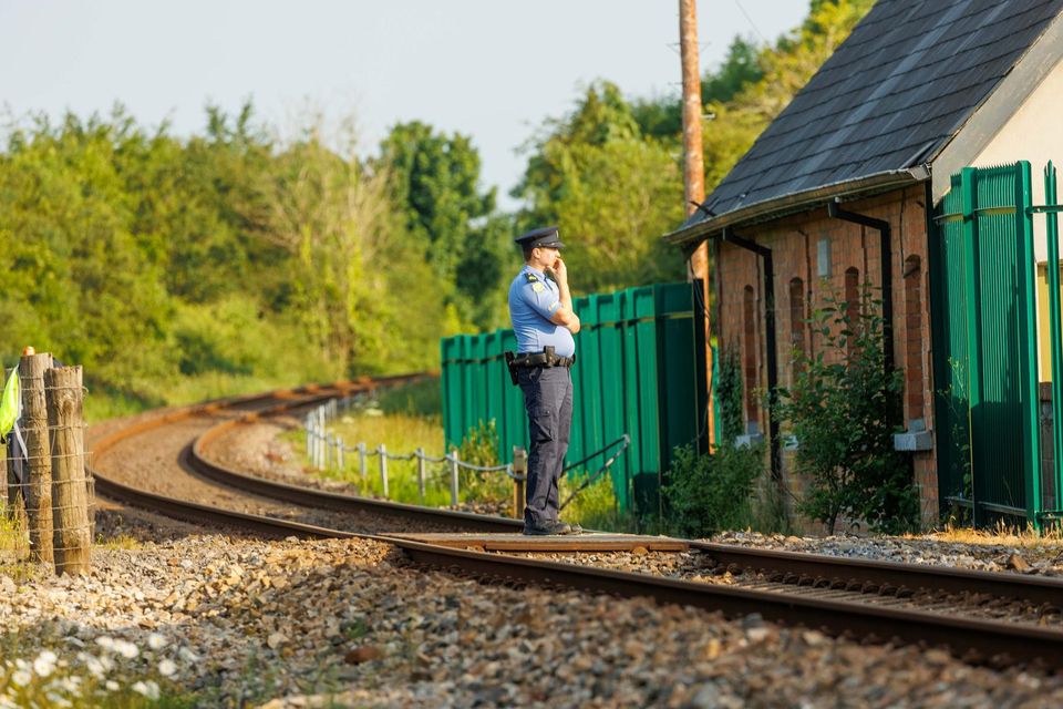 Garda near scene of train accident at Collooney, Co. Sligo. Photo: James Connolly