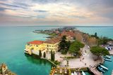 thumbnail: Aerial view from Scaglieri castle on Lake Garda and town of Sirmione in Italy.