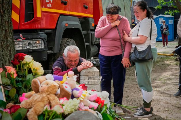 Ukrainian president Volodymyr Zelensky visits site of Kyiv apartment strike as death toll reaches 24