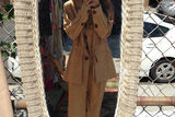 thumbnail: Rocking a 1960's YSL safari suit at a flea market in New York. Photo: Siomha Connolly Instagram