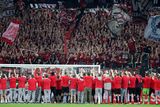 thumbnail: Bayer Leverkusen players and staff celebrate after beating Roma on aggregate to reach the Europa League final in Dublin on May 22