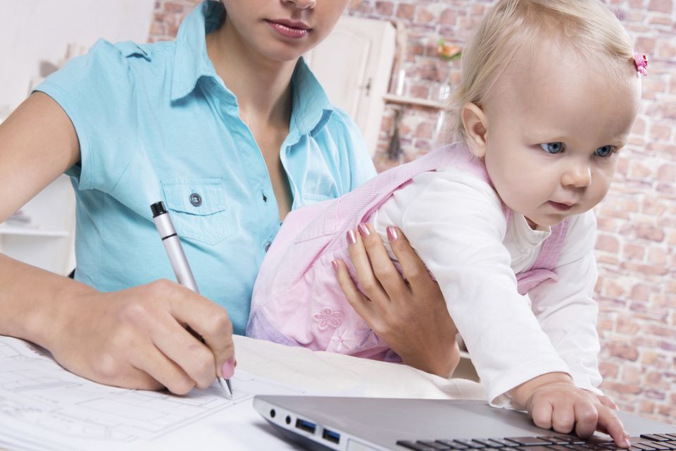 'The problem is that our current understanding of ‘working mother’ is that of babysitter, teacher, nurse, cook and maid all rolled into one frazzled fembot. And what about our understanding of dads who work? Well, they’re just men.' Photo: Getty Images/iStockphoto