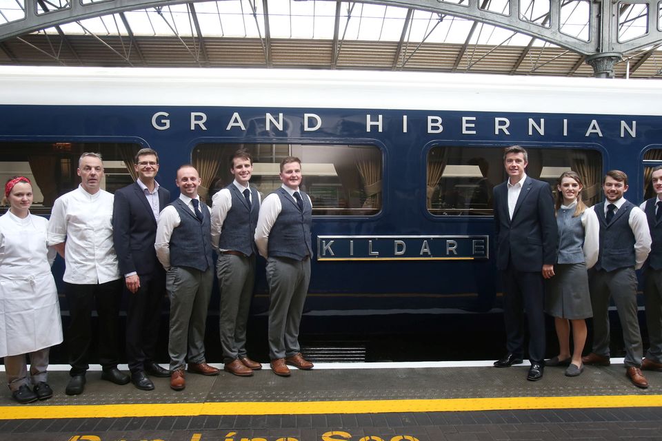 Members of staff with the Belmond Grand Hibernian, pictured after it arrived into Heuston Station for its Irish launch in 2016. File Photo: Leon Farrell/Photocall Ireland.