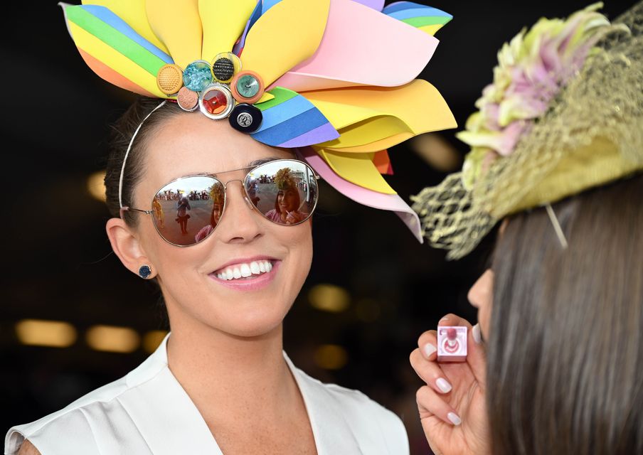 01/08/2024

Therese Conway , Oranmore uses her sisters Carita Conway glasses to put on some lipbalm at Ladies Day of the Galway Races Summer Festival in Ballybrit. Photo: Ray Ryan