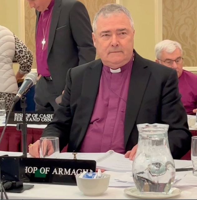 Archbishop John McDowell is challenged by members of the Burke family today.