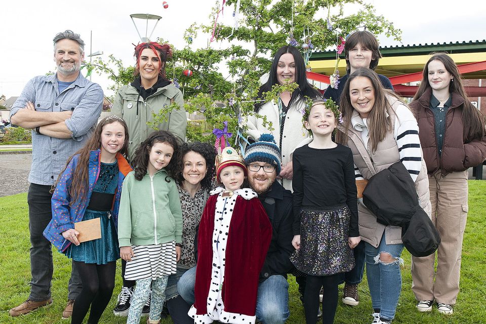 King (Ultan McGinty) and Queen (Nessa Dooley) pictured with a group at the 2023 Gorey May Bush Féile on Sunday evening. Pic: Jim Campbell