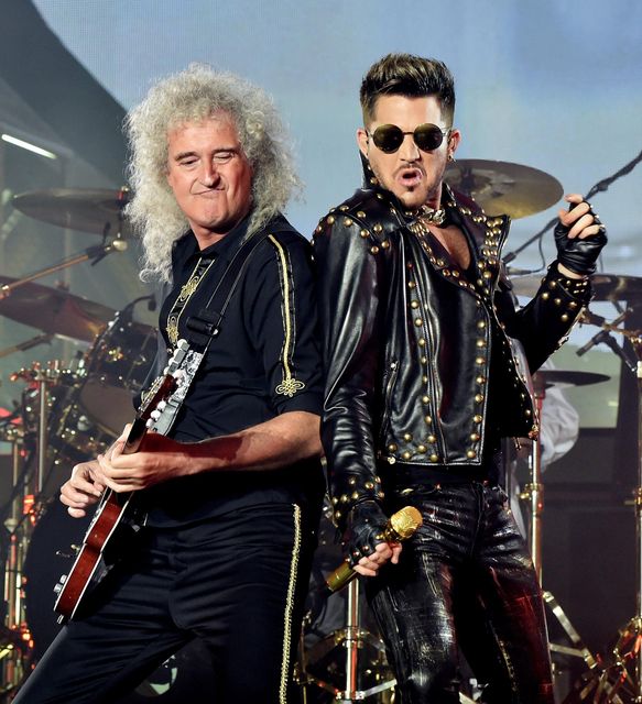 Brian May of Queen with singer Adam Lambert standing in for the late Freddie Mercury. Photo by Kevin Winter/Getty Images