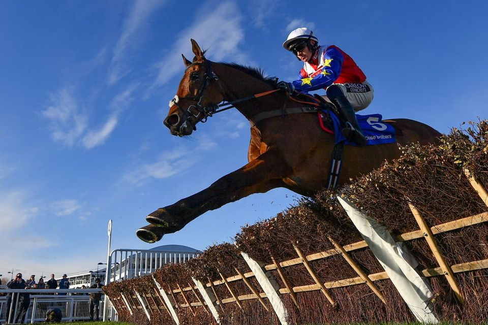 Love Envoi, with Jonathan Burke up, during the Close Brothers Mares' Hurdle during day one of this year's Cheltenham Festival. Photo By Seb Daly/Sportsfile via Getty Images