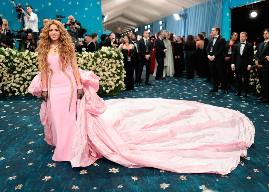 Shakira poses during the Met Gala, an annual fundraising gala held for the benefit of the Metropolitan Museum of Art's Costume Institute with this year's theme 'Superfine: Tailoring Black Style,' in New York City, New York, U.S., May 5, 2025. REUTERS/Mario Anzuoni