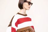 thumbnail: Stripe linen and cotton unisex sweater, €200 and bag, €285, ecrustudios.com Pic: Dylan Madden