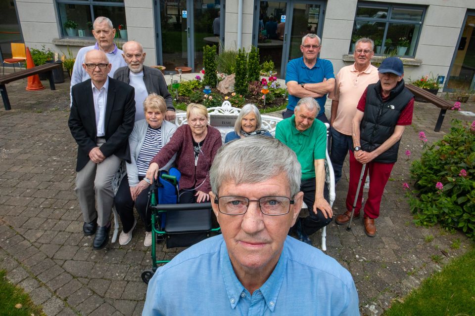Joe Dowling with residents of Killarney Court on Buckingham Street, Dublin 1. Photo: Mark Condren