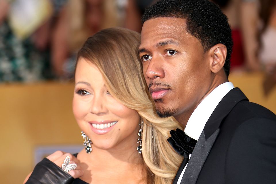LOS ANGELES, CA - JANUARY 18: Mariah Carey and Nick Cannon (R) arrive at the 20th Annual Screen Actors Guild Awards at the Shrine Auditorium on January 18, 2014 in Los Angeles, California. (Photo by Dan MacMedan/WireImage)