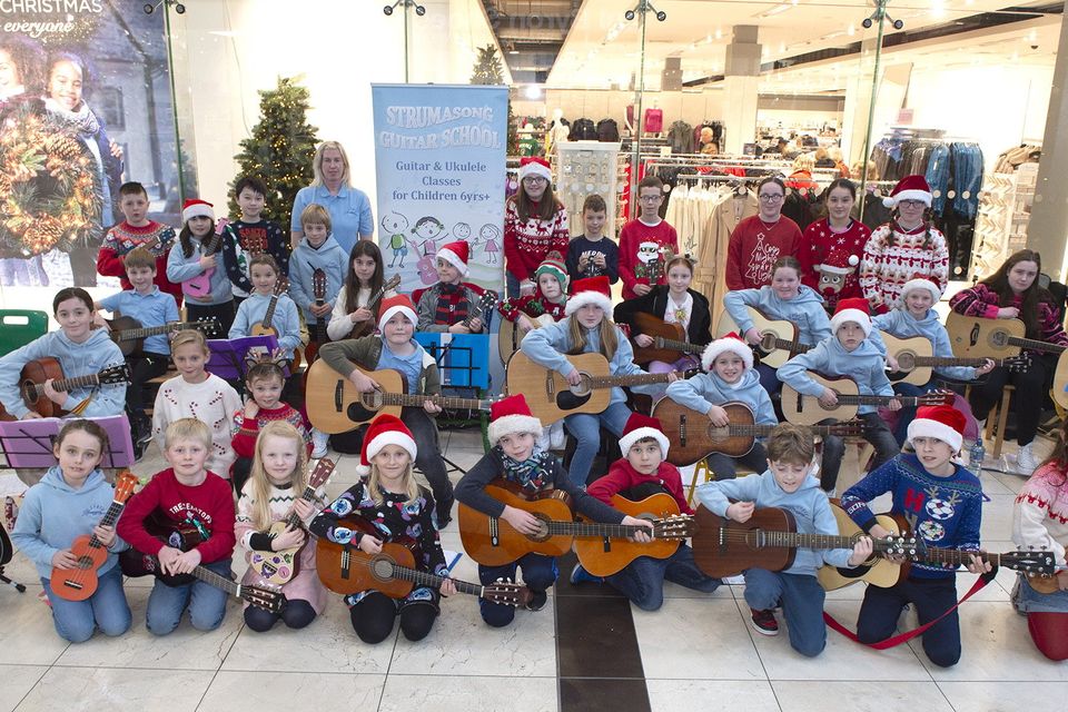 Strumasong Guitar School pictured during their fundraiser in Gorey Shopping Centre on Sunday, December 10. Pic: Jim Campbell