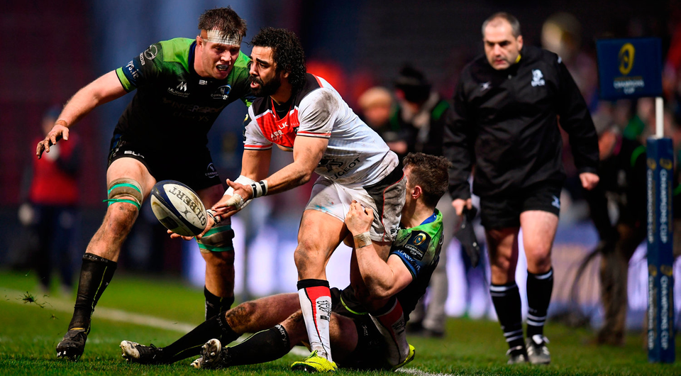 Yoann Huget of Toulouse is tackled by Matt Healy and James Cannon, left, of Connacht. Photo by Stephen McCarthy/Sportsfile
