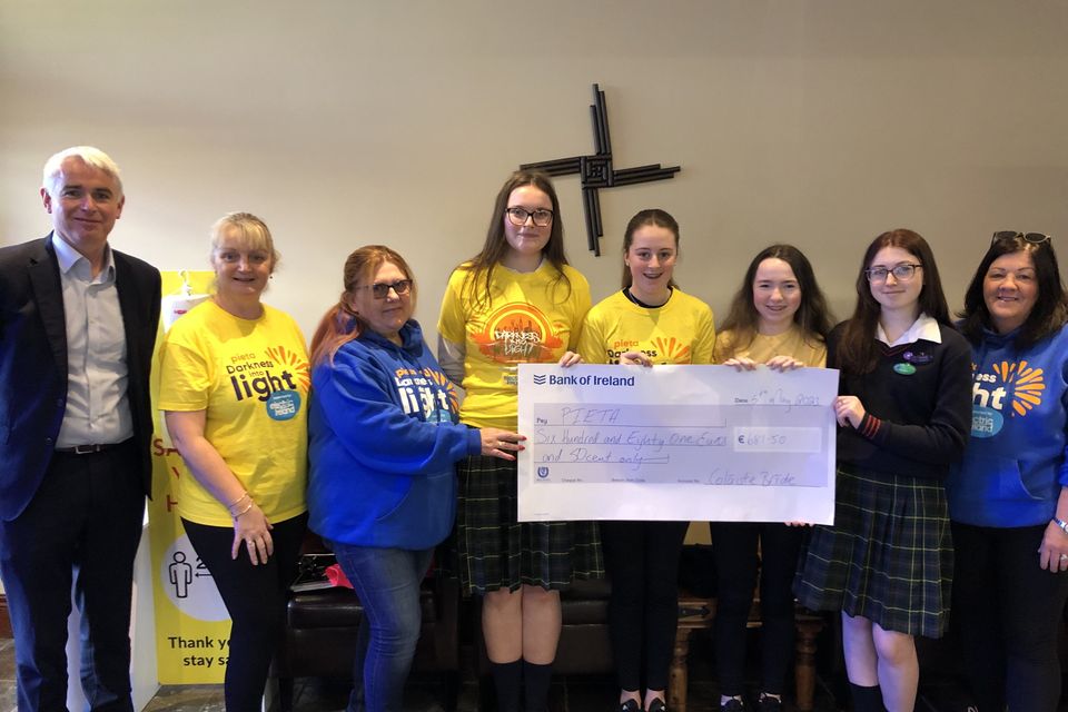Cheque presentation to Pieta from the Student Council of Coláiste Bríde with Deputy Principal Niall Moynihan.