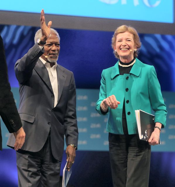 Kofi Annan shakes hands with Mary Robinson after they both spoke at the  One Young World 2014 at the Convention centre in Dublin