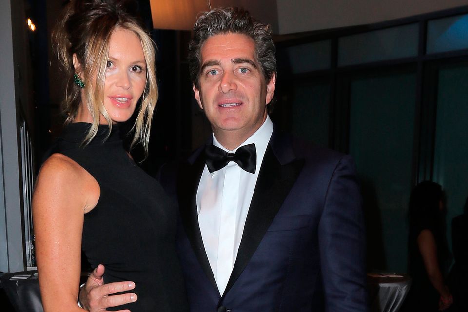 Elle MacPherson (L) and Jeffrey Soffer during Pritzker Architecture Prize 2015 at New World Symphony on May 15, 2015 in Miami Beach, Florida.  (Photo by John Parra/Getty Images for Pritzker Architecture Prize)