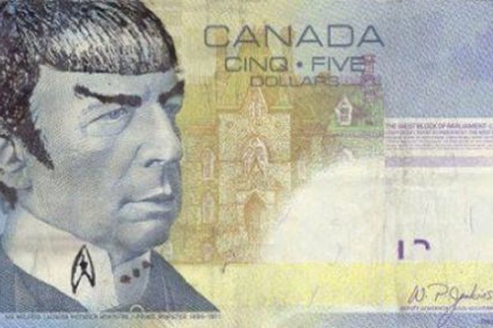 A defaced Canadian $5