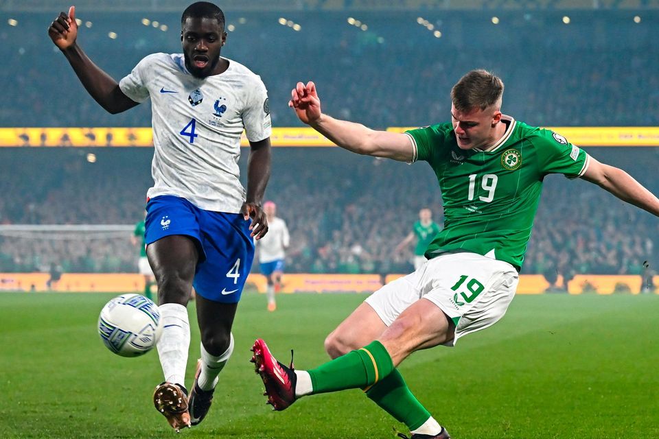 Evan Ferguson of the Republic of Ireland takes on France's Dayot Upamecano last week. Photo: Stephen McCarthy