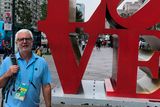thumbnail: Beatles fan John simply couldn't resist having a photo with giant LOVE sculpture