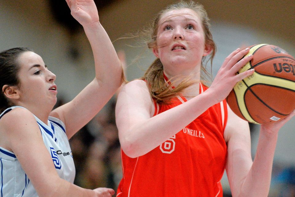 20 January 2015; Niamh Materson, Colaiste Chiarain Leixlip, in action against Amy NiChoingaile, Gael Cholaiste Mhuire A.G. All-Ireland Schools Cup U16A Girls Final, Colaiste Chiarain Leixlip v Gael Cholaiste Mhuire A.G, National Basketball Arena, Tallaght, Dublin. Picture credit: David Maher / SPORTSFILE