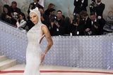 thumbnail: Doja Cat poses at the Met Gala, an annual fundraising gala held for the benefit of the Metropolitan Museum of Art's Costume Institute with this year's theme "Karl Lagerfeld: A Line of Beauty", in New York City, New York, U.S., May 1, 2023. REUTERS/Andrew Kelly