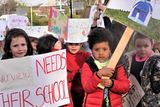thumbnail: Children Noa O'Brien, Taz Maziwisa and Iris Smith with friends from Riverview school leading the protest. Photo: Aoife de Búrca.