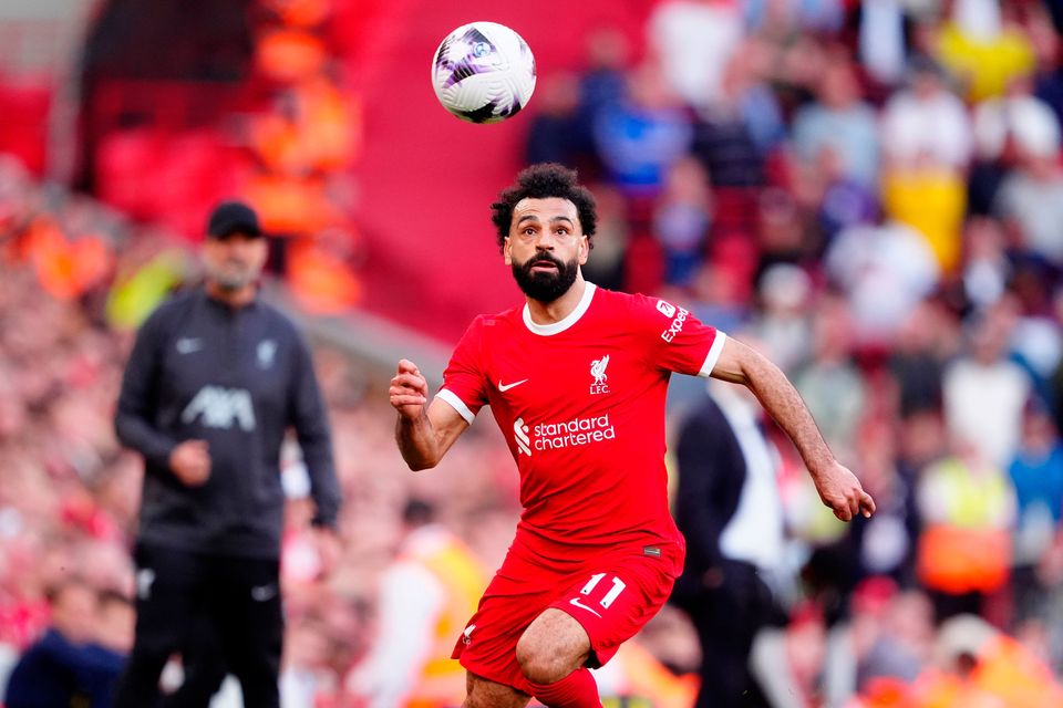 Liverpool manager Jurgen Klopp (left) watches Liverpool's Mohamed Salah in action during the Premier League win over Spurs at Anfield