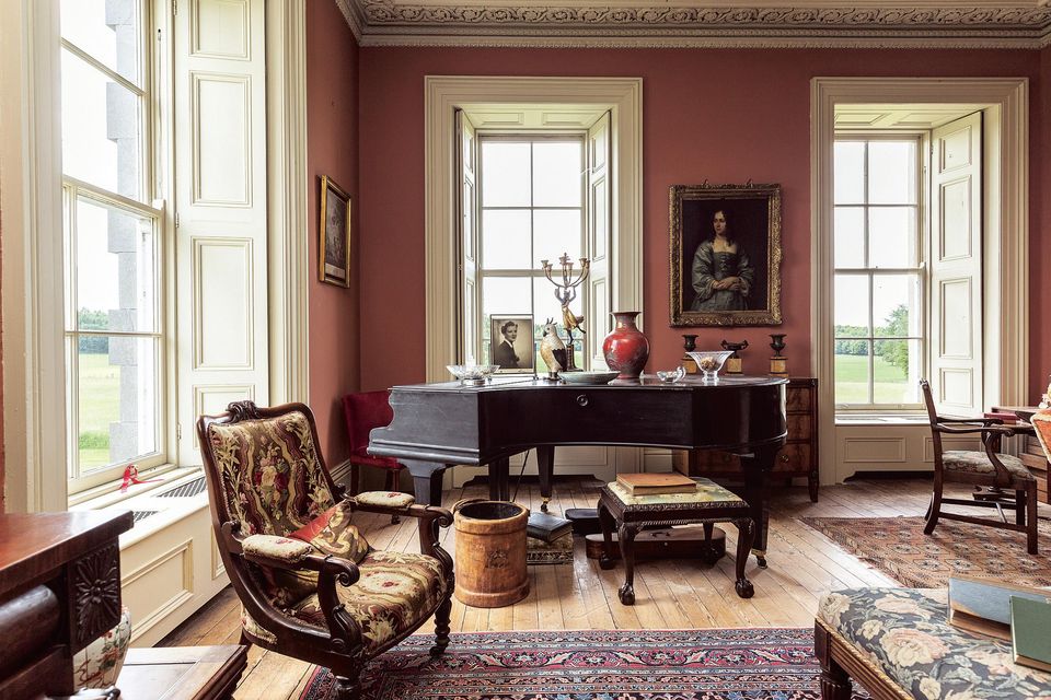 A grand piano in one of the reception rooms