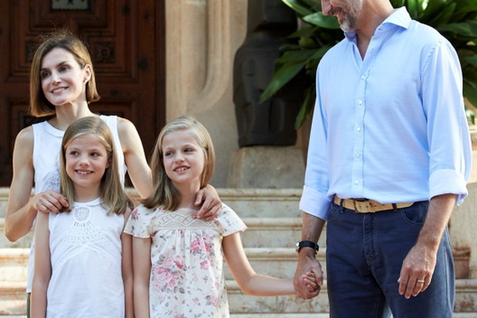 King Felipe VI of Spain, Queen Letizia of Spain and their daughters Princess Leonor of Spain (R) and Princess Sofia of Spain (L) pose for the photographers at the Marivent Palace on August 3, 2015 in Palma de Mallorca, Spain.  (Photo by Carlos Alvarez/Getty Images)