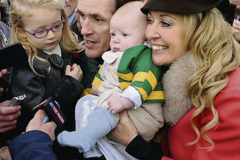 Hero: AP McCoy with daughter Eve, baby Archie Peadar and wife Chanelle. Photo: Getty Images
