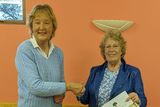 thumbnail: At the presentation of prizes for the May Bush Competition in Teach Raithneach was competition Judge Josephine Sullivan presenting 3rd Prize to Nancy Roche.