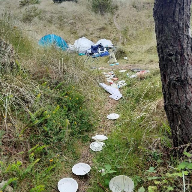 Rubbish scattered everywhere from an illegal campsite in the Raven Nature Reserve.