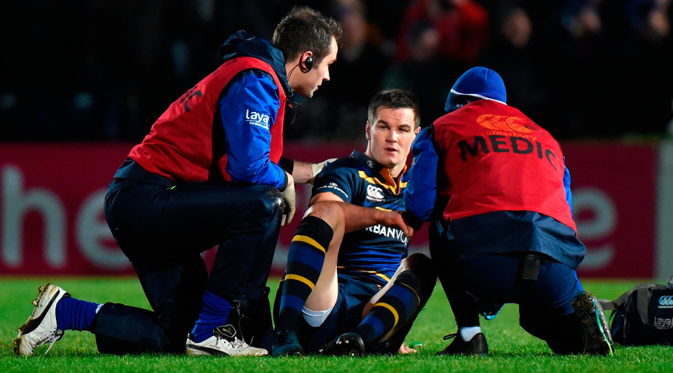 Johnny Sexton is seen by medics during the first half Photo: Matt Browne/Sportsfile