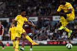thumbnail: Raheem Sterling scores for Liverpool as teammate Mario Balotelli jumps to avoid the shot during the Premier League match against West Ham United at Upton Park. Photo: Mike Hewitt/Getty Images