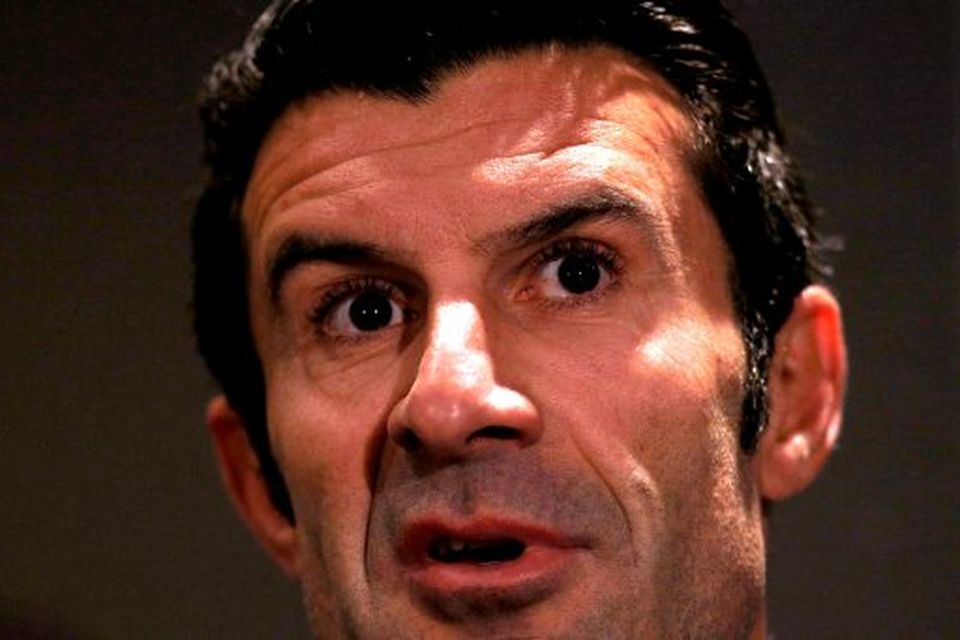 Luis Figo speaks to the media during a press conference at Wembley Stadium