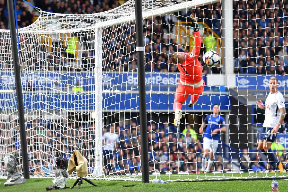 Jordan Pickford is caught out by Harry Kane's cross-shot for the opening goal