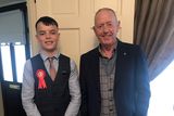thumbnail: Family man Tony Rogers with his grandson Kyle on his Confirmation day