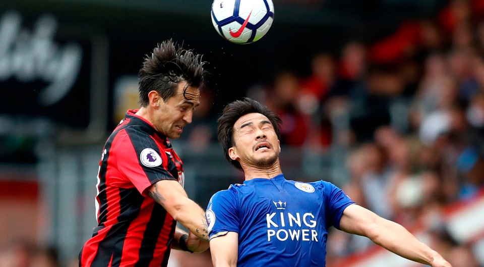 Shinji Okazaki of Leicester City and Charlie Daniels of AFC Bournemouth compete for the ball. Photo: Getty Images