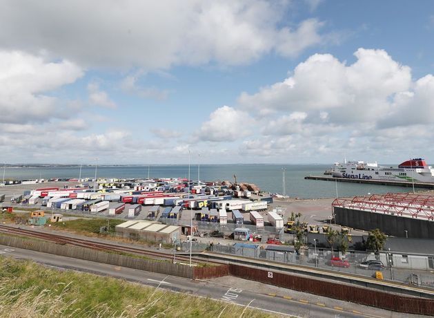 A truck driver in his 20s has been arrested by gardaí in Wexford after gardaí and customs officials found two men hiding in a truck at Rosslare Europort on Friday morning.