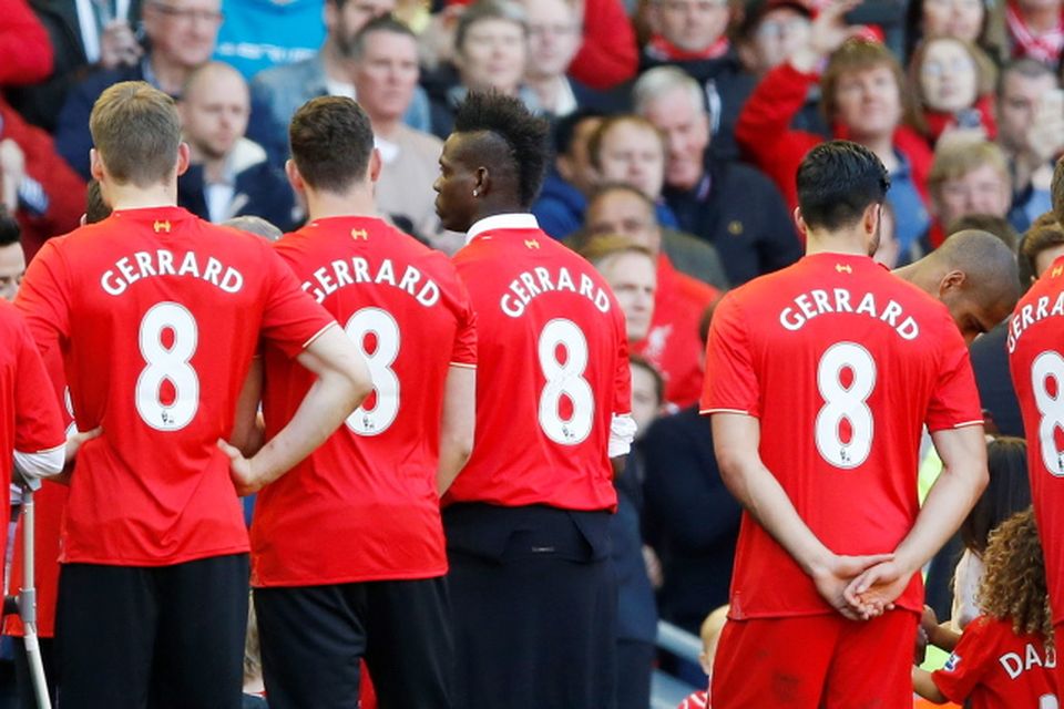 Football - Liverpool v Crystal Palace - Barclays Premier League - Anfield - 16/5/15
Liverpool players wear Gerrard shirts as they wait for Steven Gerrard to be presented on the pitch after his final game at Anfield
Action Images via Reuters / Carl Recine