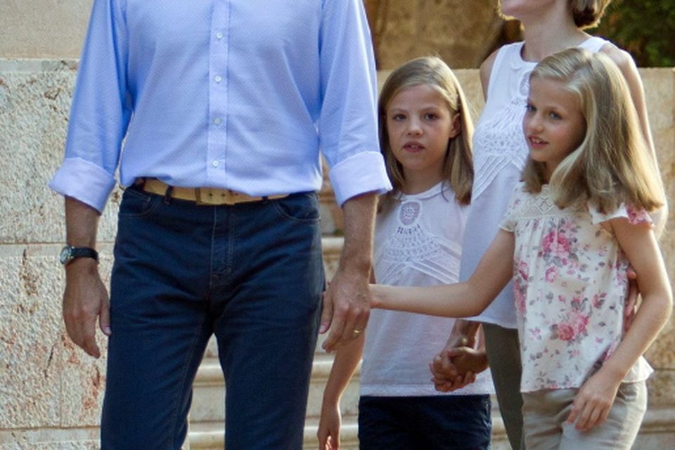 Spanish King Felipe VI (L) and Queen Letizia (2nd R) pose with their daughters Spanish crown princess Leonor (R) and princess Sofia at the Marivent Palace on the island of Mallorca on August 3, 2015. AFP PHOTO / JAIME REINAJAIME REINA/AFP/Getty Images